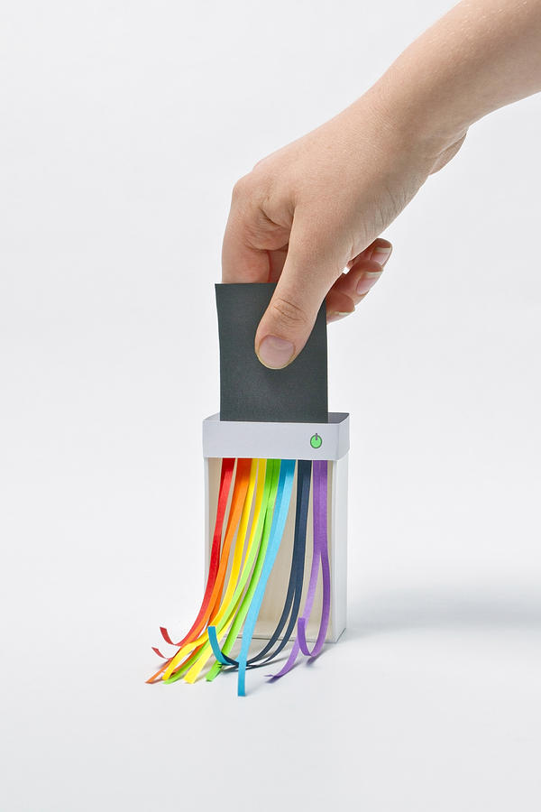 Rainbow paper shredder Photograph by Catherine MacBride