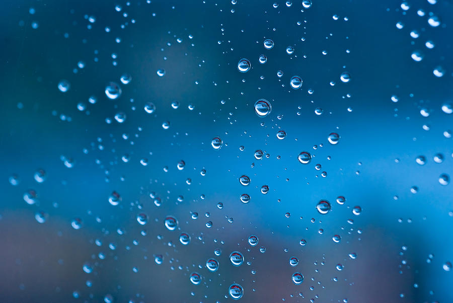 Raindrops on  window Photograph by Luisapuccini