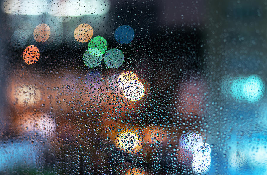 Raindrops On Window, Night City View Through Window Photograph