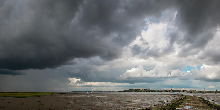 Rainstorm approaching Harty Ferry Photograph by Gary Eason