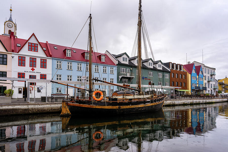Rainy Reflections in Torshavn Photograph by Alicia Glassmeyer