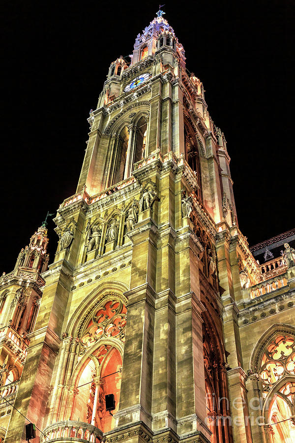 Rathaus Tower at Night in Vienna Photograph by John Rizzuto