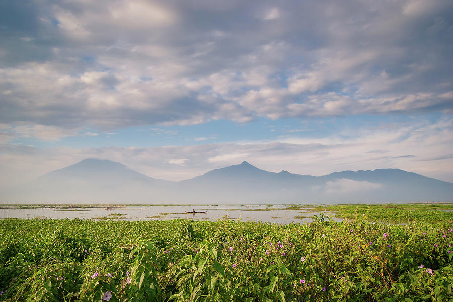 Rawapening lake in Central Java with mist and clouds in the sky Photograph by Anges Van der Logt