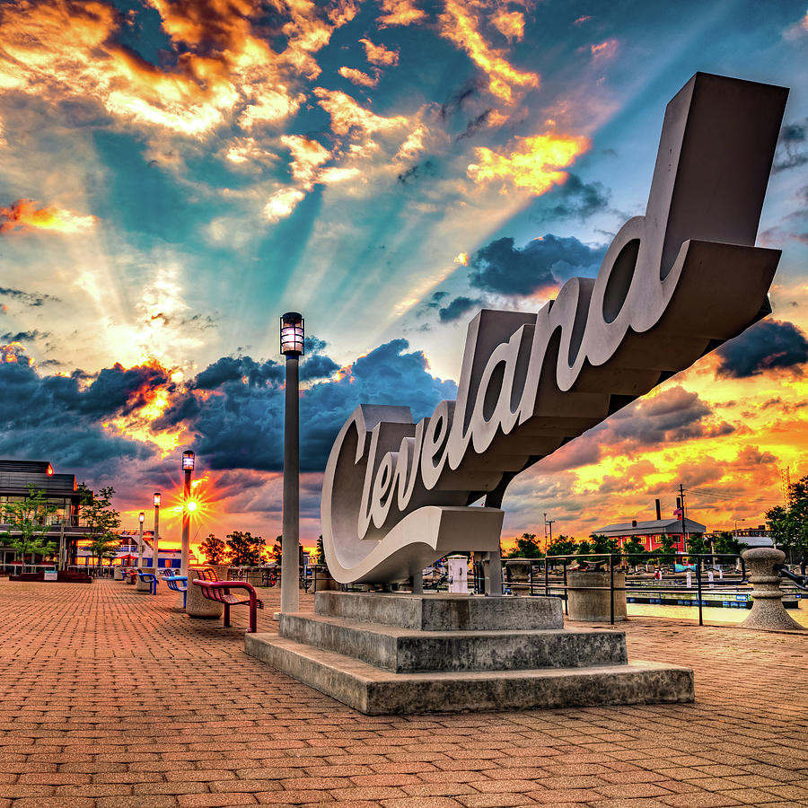 Cleveland Ohio Photograph - Rays of Light Over The Cleveland Script Sign on North Coast Harbor by Gregory Ballos