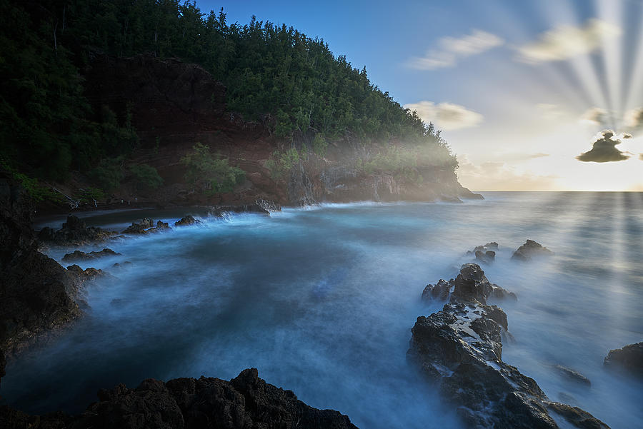 Rays on Red Sand Beach Photograph by Jon Glaser