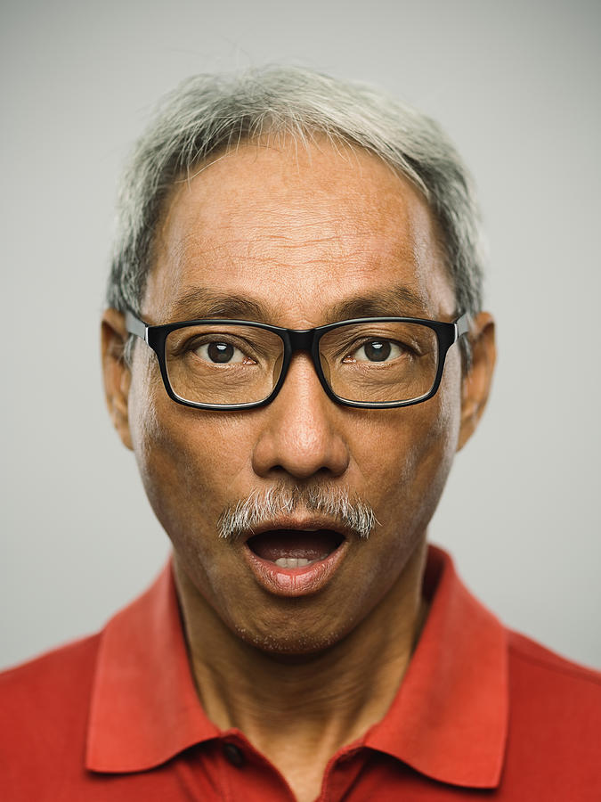 Real chinese senior man with surprised expression Photograph by SensorSpot