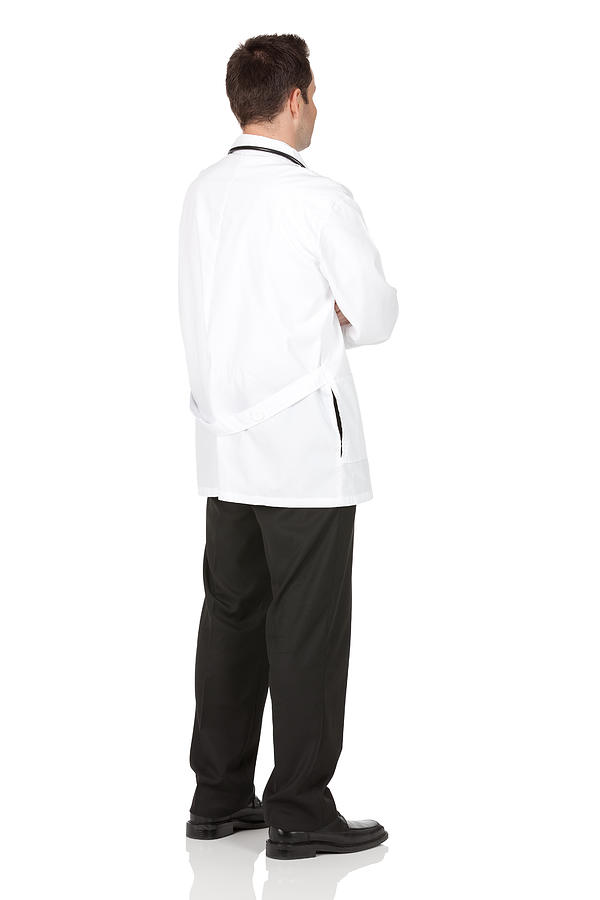 Rear view of a male doctor standing with arms crossed Photograph by 4x6