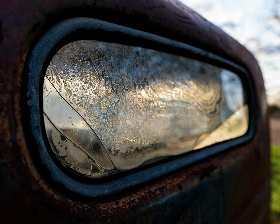 Rear Window on an old Chevy Truck Photograph by Art Whitton