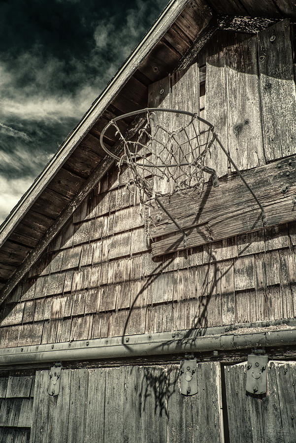 Recess Memories #1 of 2  - An old basketball hoop on a weathered Wisconsin shed at Cooksville School Photograph by Peter Herman