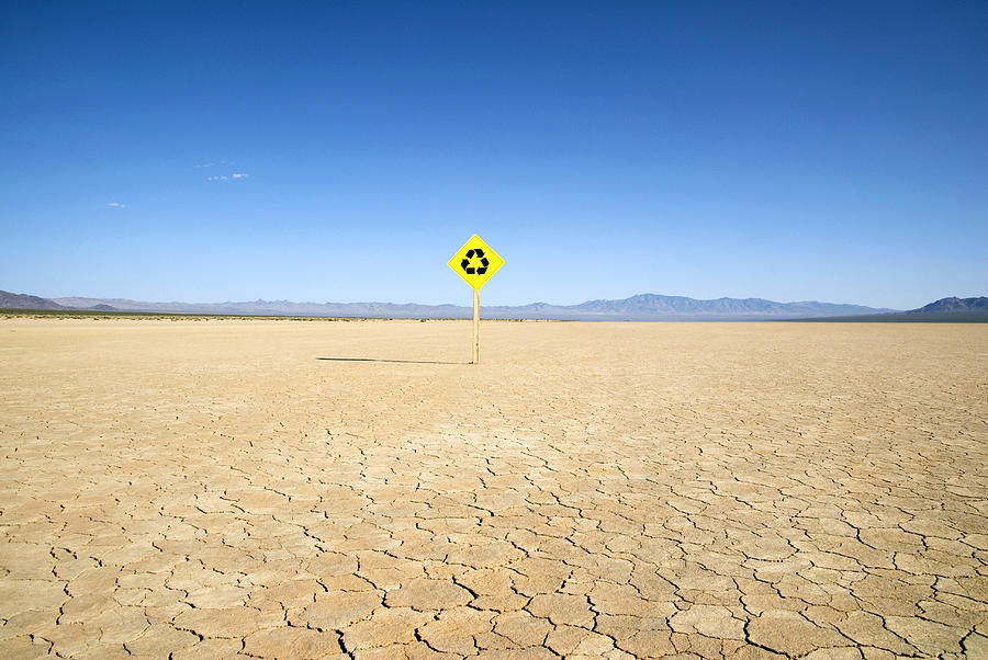 Recycle traffic sign on dry lake bed.  Photograph by Pete Starman