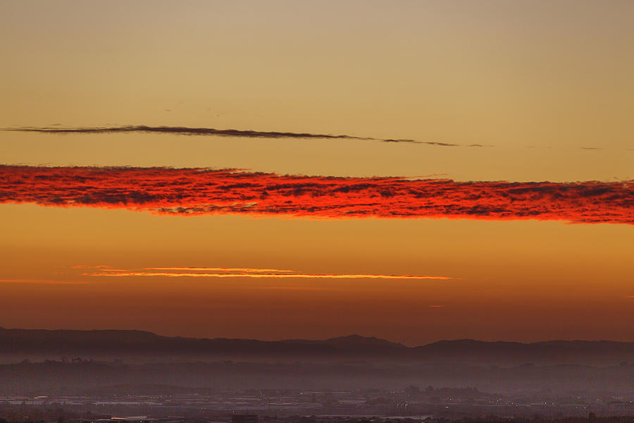 Red and orange cloudy sunrise sky Photograph by Jason KS Leung