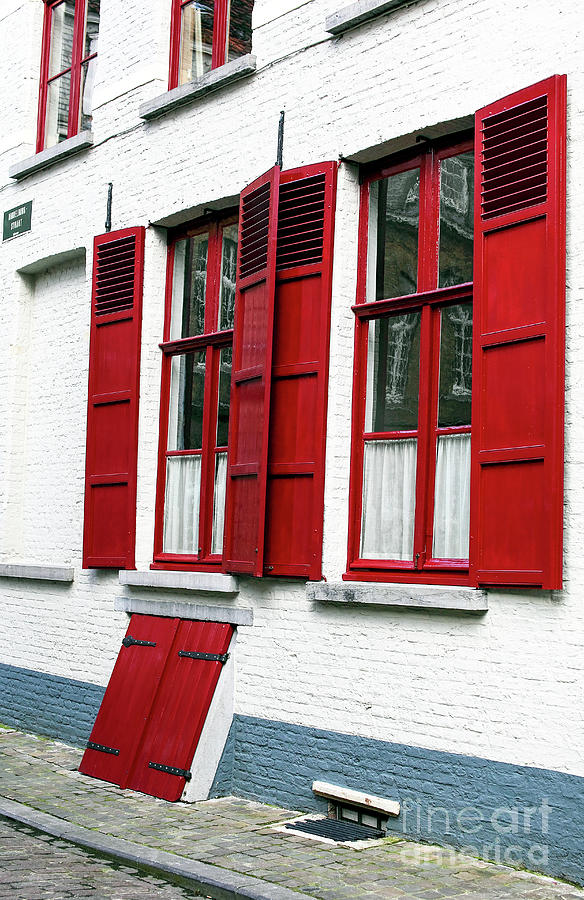 Red and White in Bruges Photograph by John Rizzuto