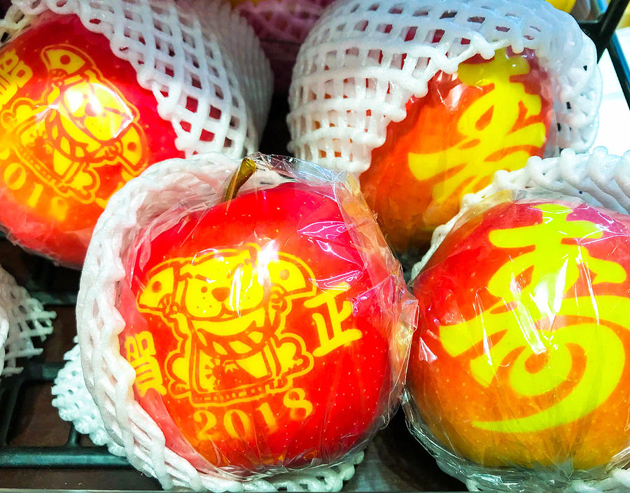 Red apples having Japanese traditional patterns for New Year decoration Photograph by DigiPub