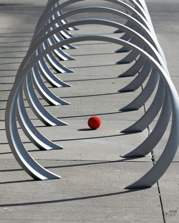 Red Ball at the Bike Rack Photograph by Christopher McKenzie