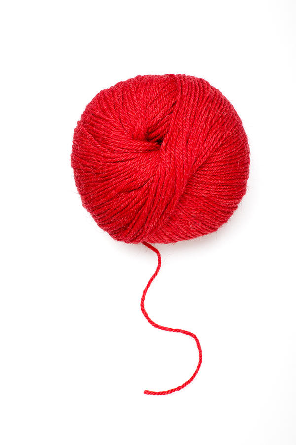 Red ball of wool on white background Photograph by Yevgen Romanenko