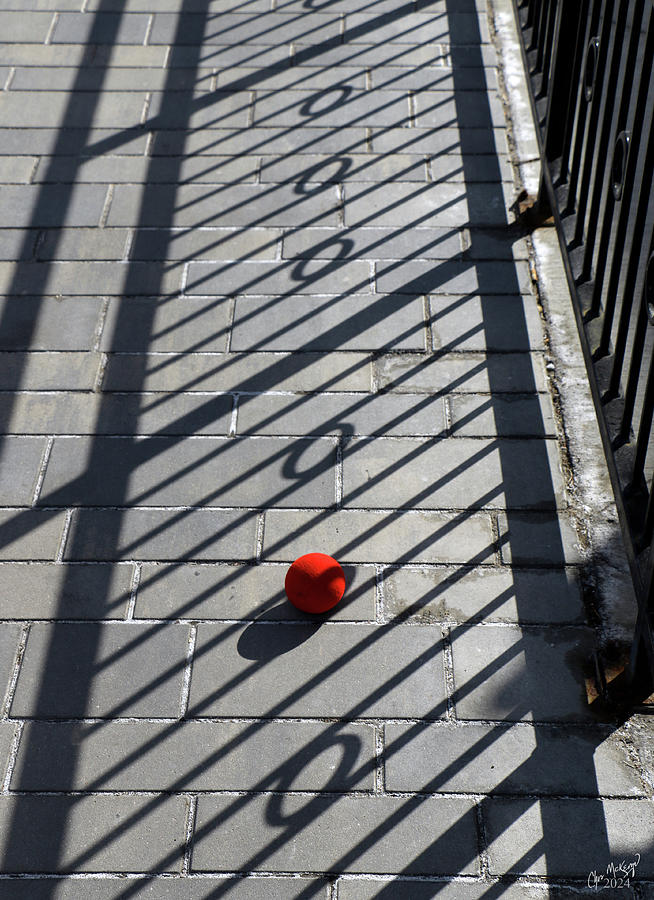 Red Ball on the Walkway Photograph by Christopher McKenzie