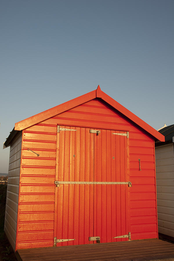 Red beach hut Photograph by Moorefam