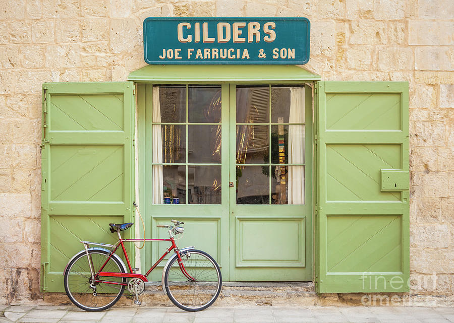 Red Bicycle outside Green doors of traditional Gilders shop, Mdina, Malta Photograph by Neale And Judith Clark