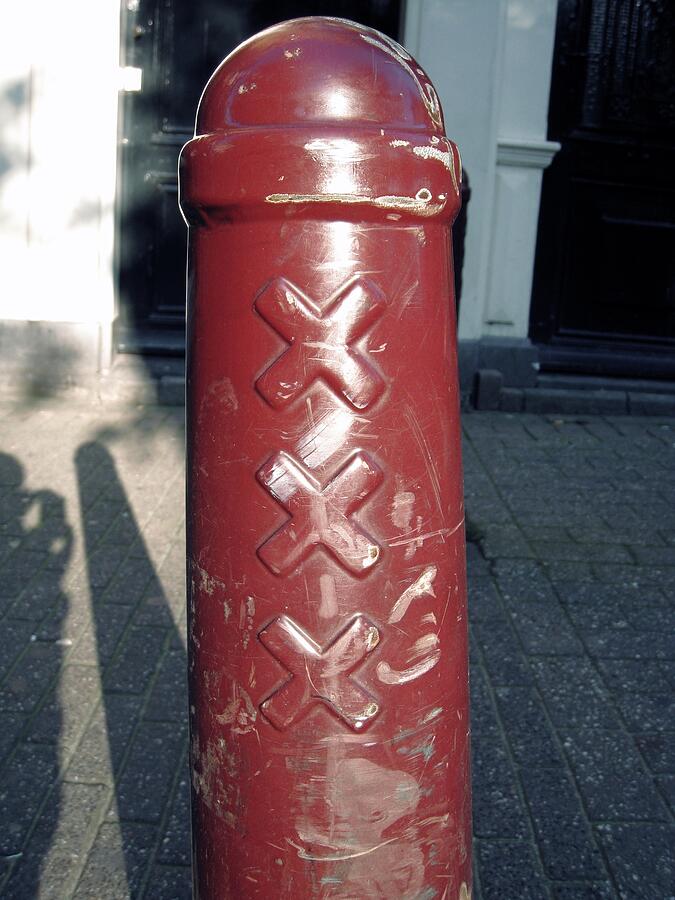Red Bollard in Amsterdams Historic Streets Photograph by Travel Essayist Red Bollard in Amsterdams Historic Streets Photograph by Travel Essayist