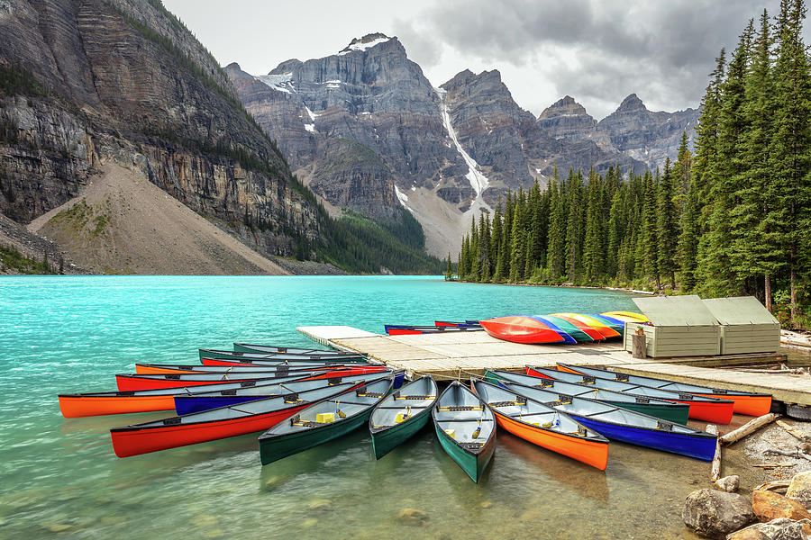 Red Canoe Moraine Lake Blue Water Photograph by Pierre Leclerc Photography