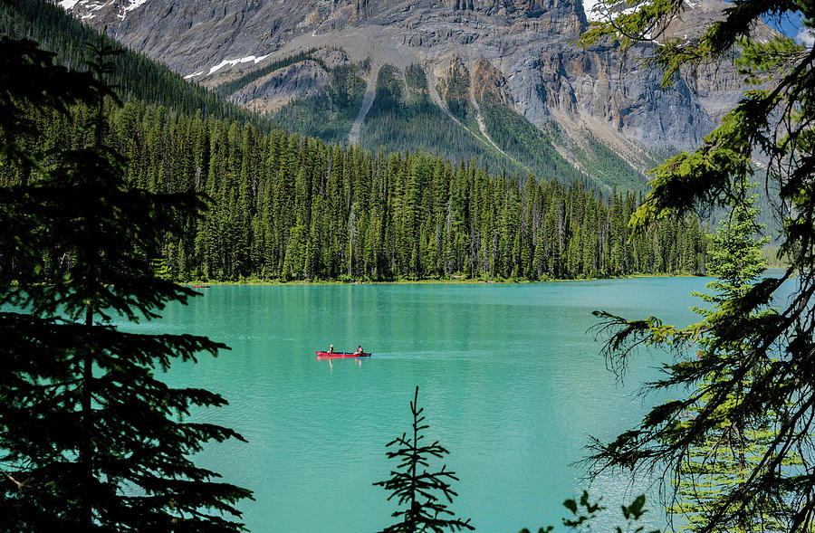 Red Canoe on Emerald Lake Photograph by Debbie Karnes