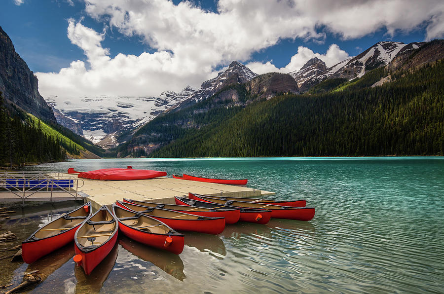 Red Canoes on Lake Louise Photograph by Tracy Munson