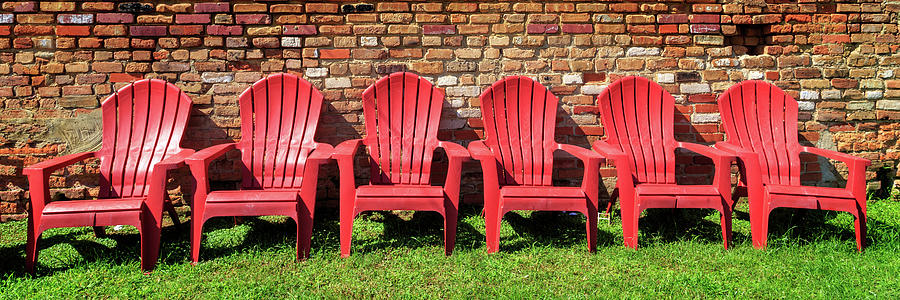Red Chairs And A Brick Wall Photograph by James Eddy