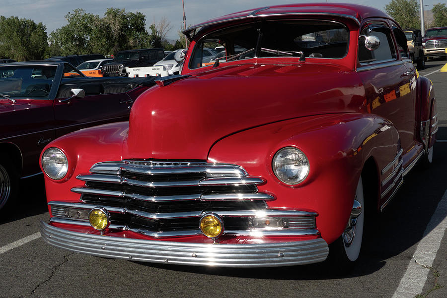 Red chevy Photograph by Ron Roberts