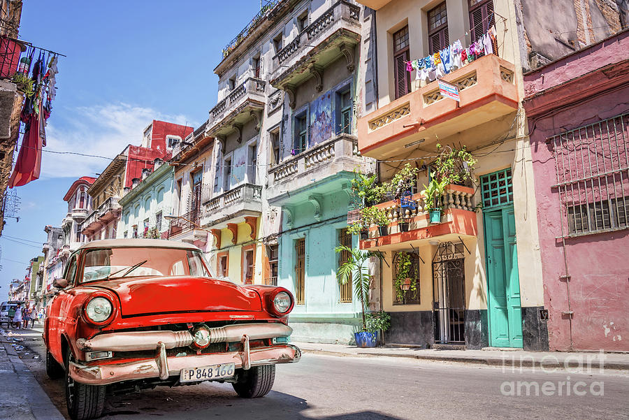 Red classic car in Cuba Photograph by Delphimages Photo Creations