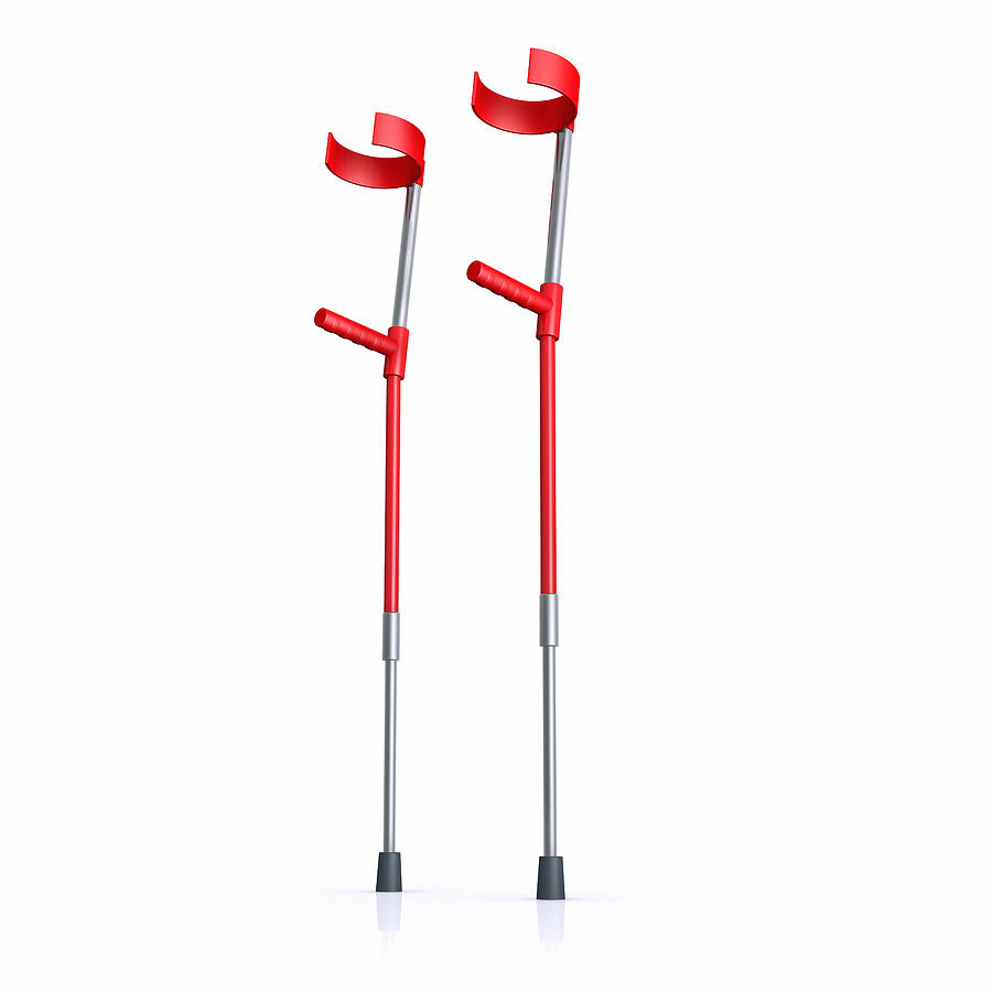 Red crutches on a white background Photograph by Artpartner-images