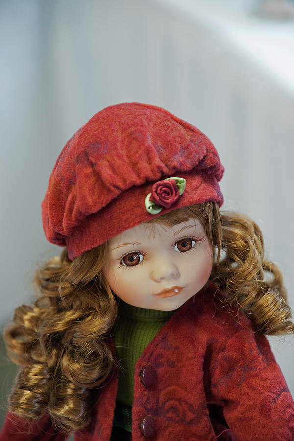 doll with red curly hair