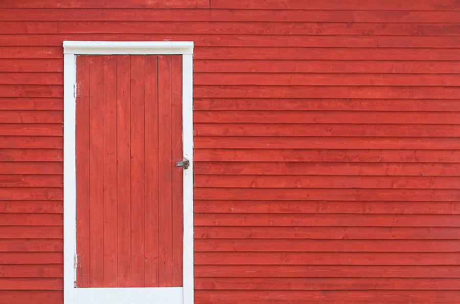 Red Door And Exterior Clapboard Wall Photograph by Cjmckendry
