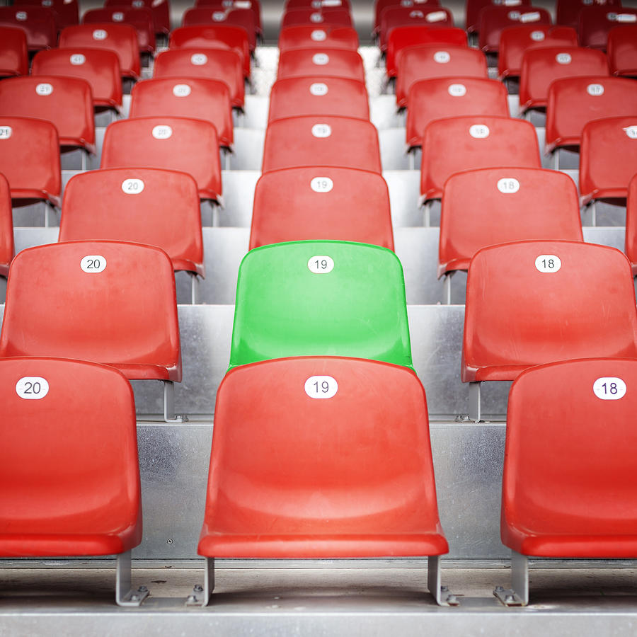 Red empty stadium seats Photograph by Ollo