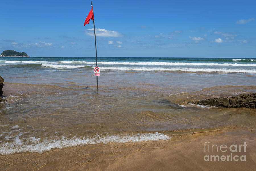 Red Flag On The Beach. Swimming And Surfing Ban. Photograph