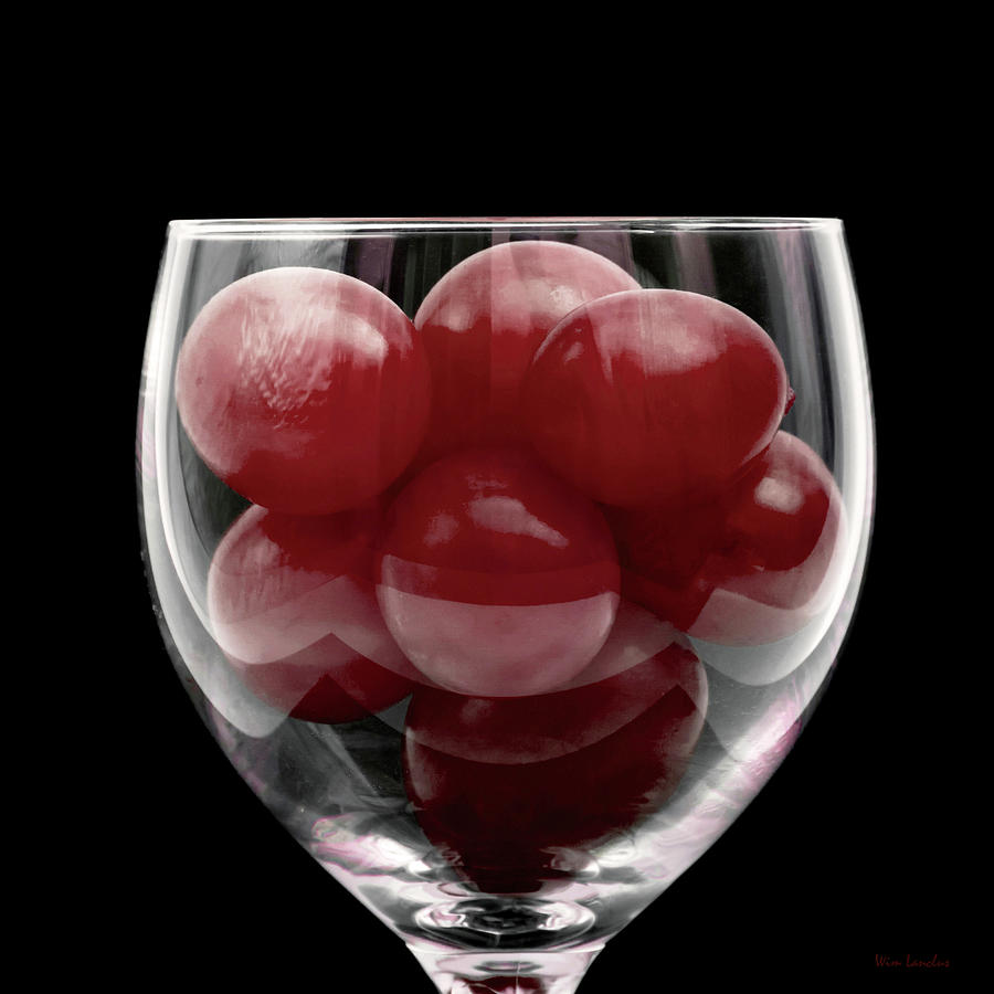 Wine Photograph - Red Grapes in Glass by Wim Lanclus