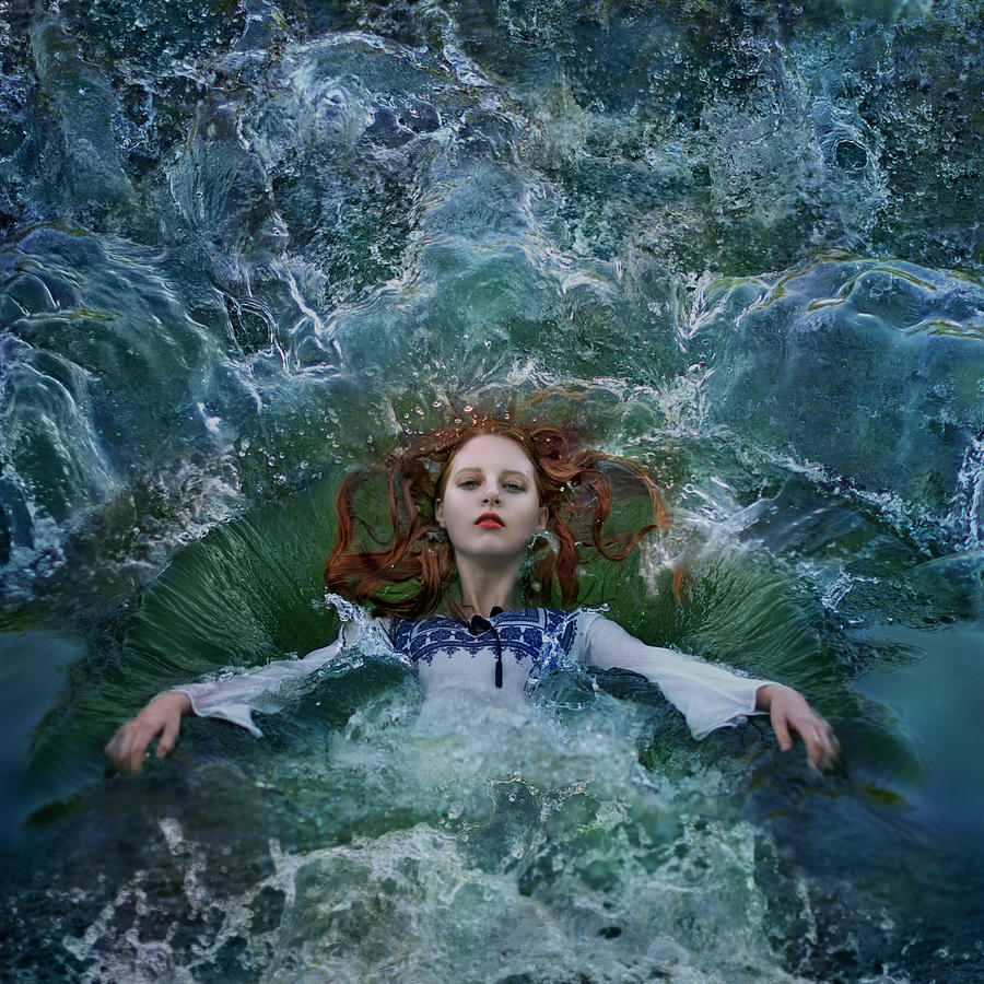 Red haired woman falling into water Photograph by Nina Sinitskaya