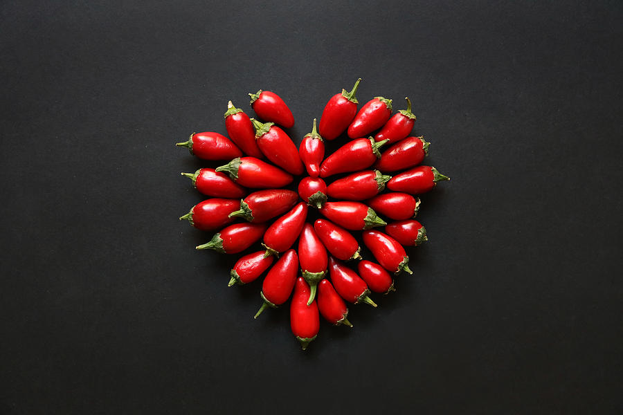 Red jalapeno peppers in a heart shape Photograph by JeannineMcChesney