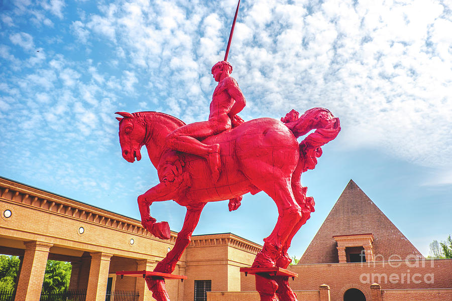 red knight and horse with pyramid background at the Masone Labyrinth Museum in Fontanellato - Parma - Italy Photograph by Luca Lorenzelli