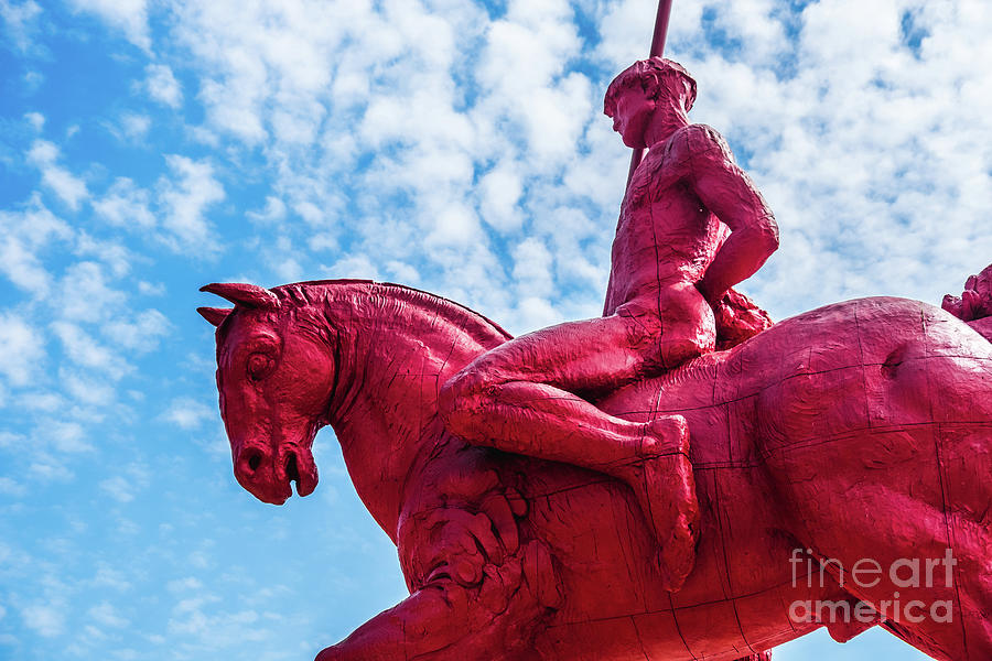 red knight and horse with sky background at the Masone Labyrinth Museum in Fontanellato - Parma - Italy Photograph by Luca Lorenzelli