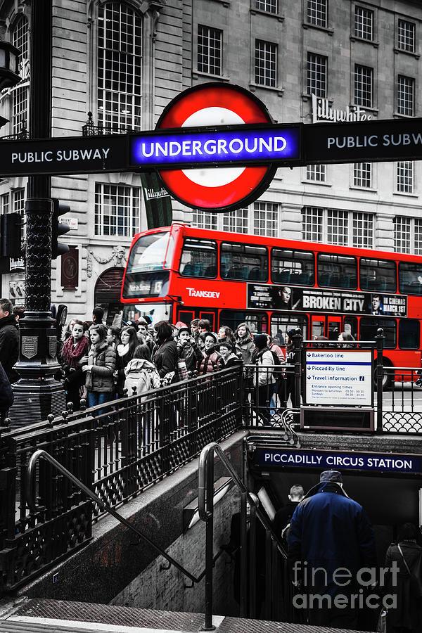 Red London Bus and London underground sign Photograph by Peter Noyce ...