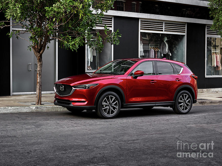 Red Mazda sports SUV in car park Photograph by Thomas Jones | Pixels