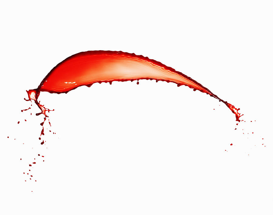 Red paint against white background, close-up Photograph by Ryan McVay
