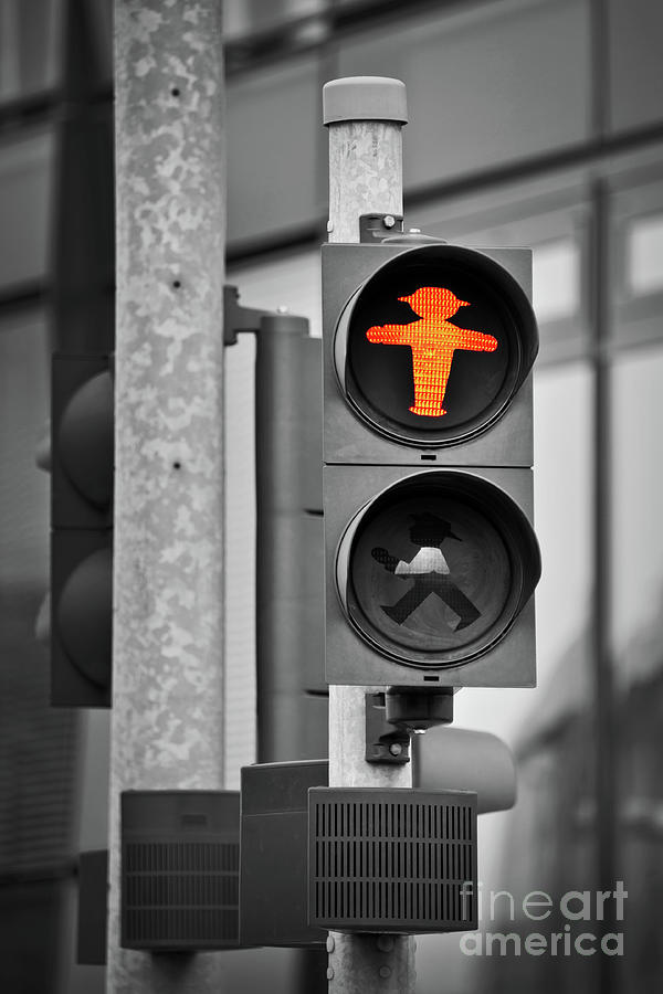 Red pedestrian traffic light in Berlin Photograph by Delphimages Photo Creations