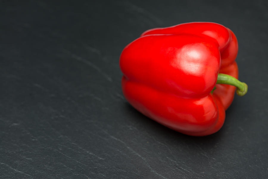 Red Pepper on a Slate Surface Photograph by Tim Grist Photography