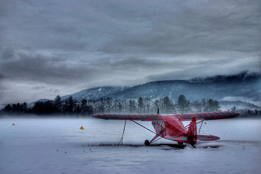 Red Plane in a Gathering Storm Photograph by Wayne King