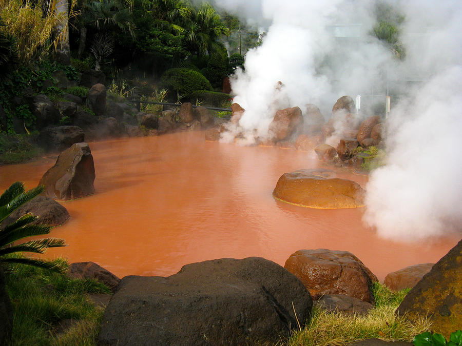 Red pool of steaming water Photograph by Jeff Case