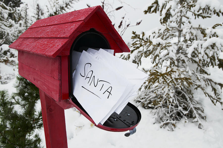 Red Post Box Containing Letters to Santa Photograph by Digital Vision.
