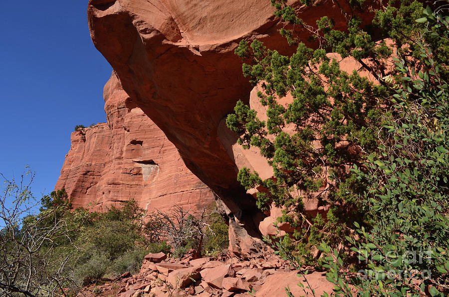 Red Rock Cliff with Falling Rocks in Sedona Photograph by DejaVu