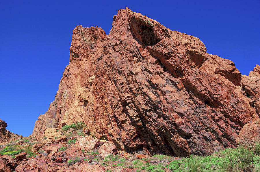 Red sharp-edged rock in Teide National Park Photograph by Sun Travels