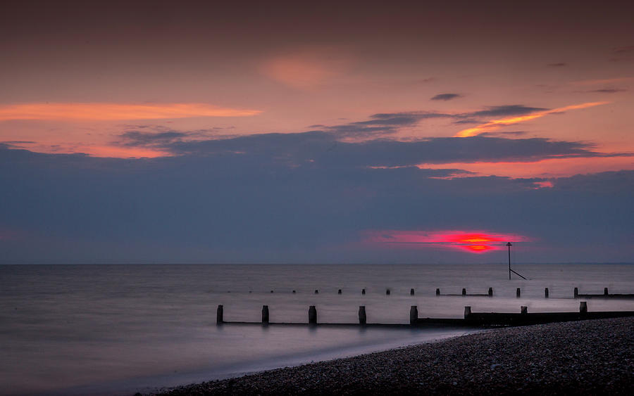 Red sky at Selsey Photograph by Chris Boulton